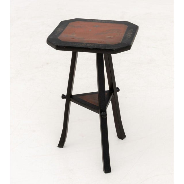 Japanese Ebonized Wood and Paint-Decorated Tripod Table, the top hand-painted with landscape scene of Mount Fuji, the...