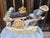 ## Title Vintage Italian Chinoiserie Faux Alabaster Prosperity Cart Sculpture ## Description A substantial and intricately...
