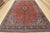 An authentic vintage traditional Sarouk rug hand-knotted with fine wool and natural dyes. This oriental rug features a...
