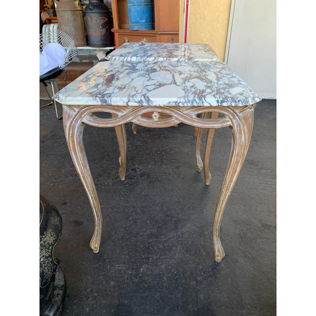 Elegant, sculptural matching pair of side tables. Beautiful Italian marble tops that are removable. Gorgeous stand of...