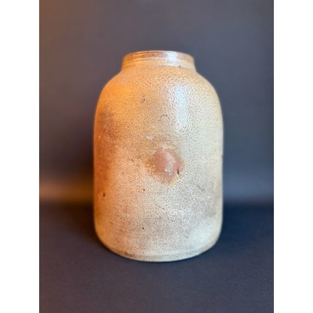 Antique Stoneware Crock with wonderful earth tone beige to cream color finish. There is wonderful patina to this pickling...