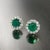 These Magnificent Natural Finely Faceted Quality Emerald and White Diamond Halo Earrings are a luxurious addition to any...