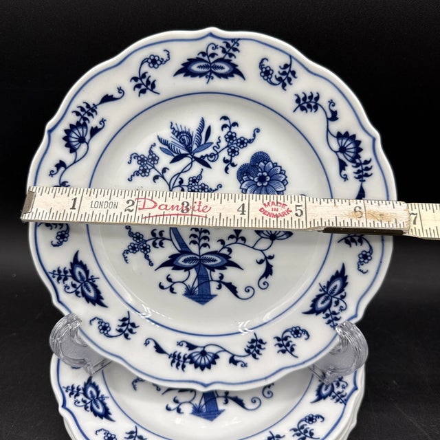 Classic and timeless, this set of four Blue Danube bread plates features the iconic Blue Onion pattern in rich cobalt blue...