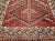 This vintage Persian Shiraz tribal area rug is a striking example of Southwestern Persia’s weaving heritage, featuring a...