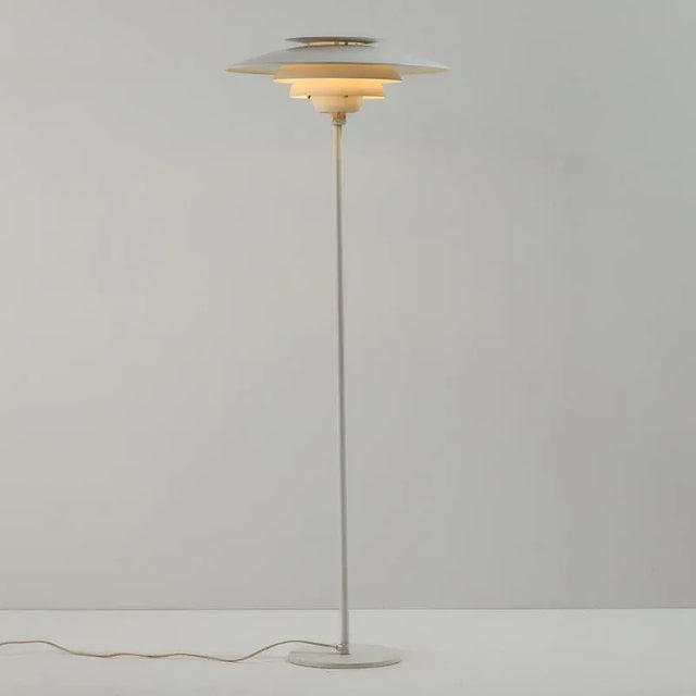 Danish ‘1049-G’ aluminium floor lamp from the 1970s produced byJeka Metaltryk. The surface of the lamp has scratches, rust...