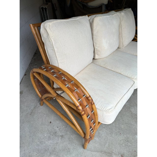 Upscale Whitecraft by Woodard Furniture woven leather sofa. Had three bottom and back cushions. Measures 83” w x 31” d x...