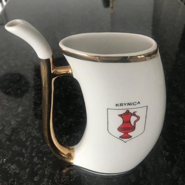 Porcelain jug signed Ćmielów 60/70 XX century. DIMENSIONS: Height - 16.5 cm. Width - 11.5 cm. Depth - 4.5cm.