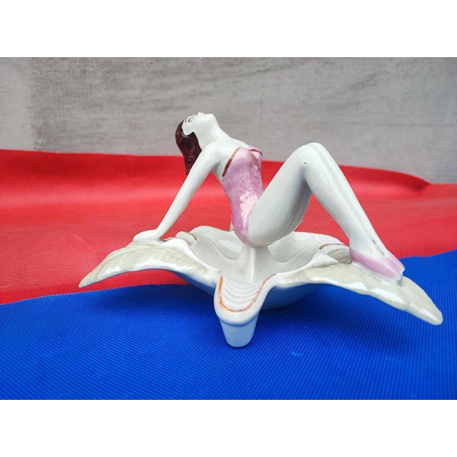 Porcelain lady figure, Steatyt Katowice, 1960s, ashtray, dimensions height 10 cm, width 16 cm, depth 18 cm.