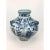 This wonderful blue and white Yuen dynasty vase features court officials under oriental foliage with lion's head handles...