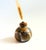 A vintage studio pottery bud vase. Finished in natural colored drip glazes. Unique design with a detachable lid that has a...