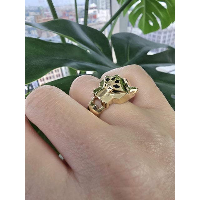 Cartier Panthere 18K yellow gold ring Tsavorite garnet eyes and onyx pattern Ring size 53 US 6.5 Serial #NB5657 All...