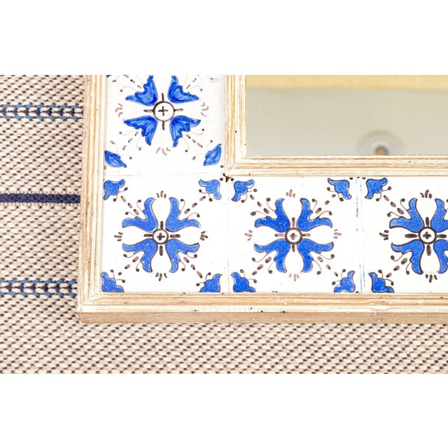 Beautiful Vintage French Mirror with surround of Blu&white antique hand-painted tiles ( possibly Delft) set in an elegant...