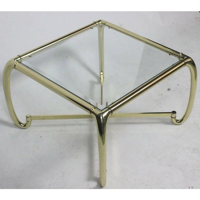 Mid-Century Modern by Mastercraft-sculptural polished brass square coffee table with glass inset top. Provenance: From the...