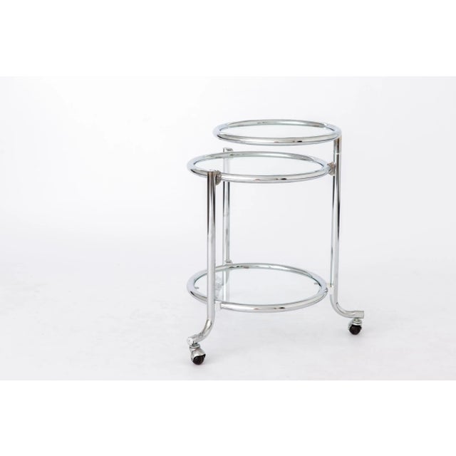Nice Vintage Side Table. Production period approx. 1960s-1970s. Good condition, sturdy chromed metal frame. Movable top....