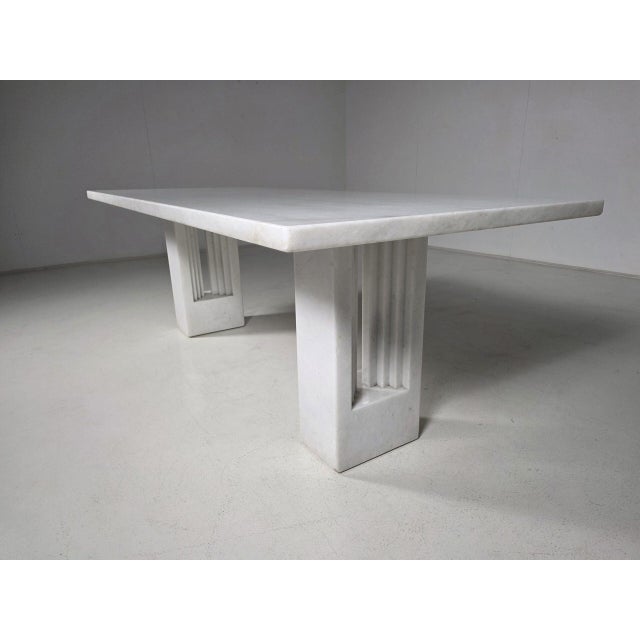 Monumental “Delfi” dining table designed by Carlo Scarpa and Marcel Breuer for Simon Gavina, 1970s A part of the...