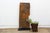 Hand-carved from a single length of hardwood, this door carries Mali's Dogon or Bamana geometric tradition in a dense...