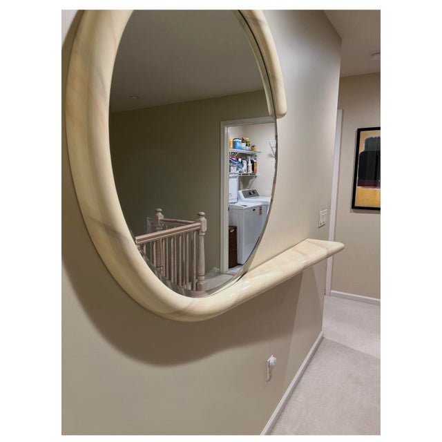 Vintage Postmodern Jay Spectre Wall Mirror Console Shelf Striking postmodern wall mirror with an integrated floating...