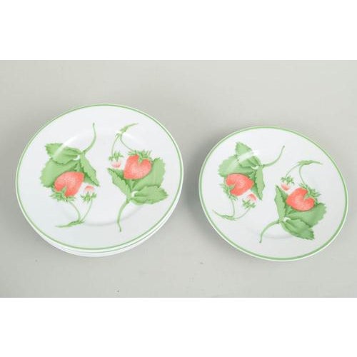 Bill Goldsmith for Limoges, Fraise, set of 5 plates. Set of five small porcelain plates decorated with strawberries and...