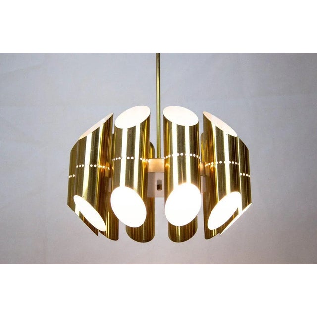 Brass chandelier. Very good quality. I have official proof of authenticity such as vintage catalogs, designer records, or...