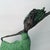 This captivating sculpture presents a figure in graceful motion, exuding an ethereal sense of freedom and elegance. The...