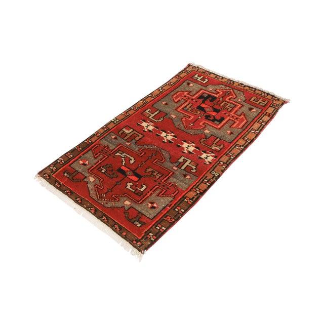 Vintage Handknotted decorative mini rug from Kars region of Turkey. Approximately 45-55 years old. In very good condition.