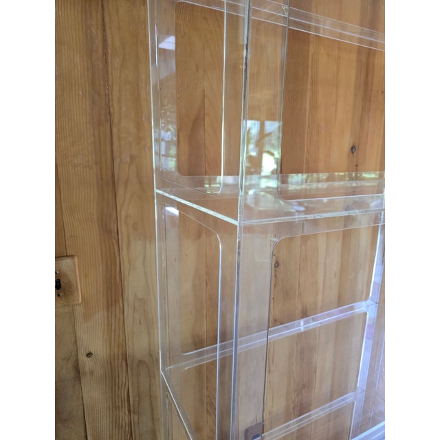 A true vintage original mid century modern era designer lucite tall etagere. Having superb quality dating from 1970s or...