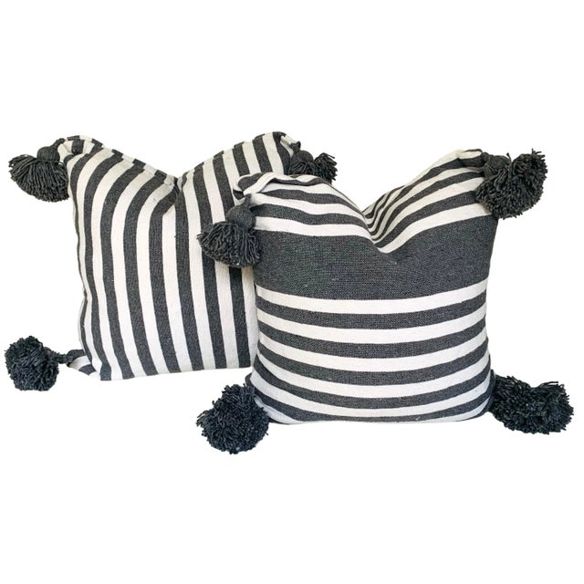 Pair of Moroccan handloomed cotton pom pom pillows with zipper closure New duck feather-and-down fill inserts. Pattern on...