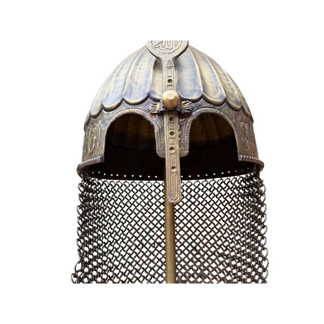 This Ottoman Style Casque stands as a profound testament to the rigorous metalworking traditions of the past, meticulously...