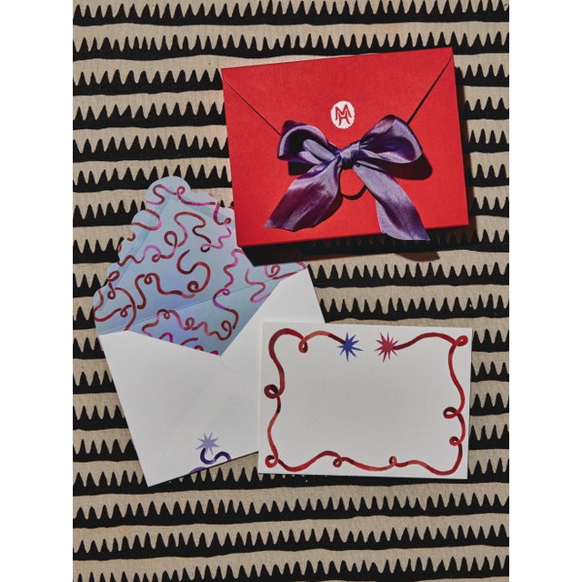 Set of 20 A6 notecards (sized at 4.5” x 6.125”) and matching envelopes. The cards feature energetic ribbons painted by...