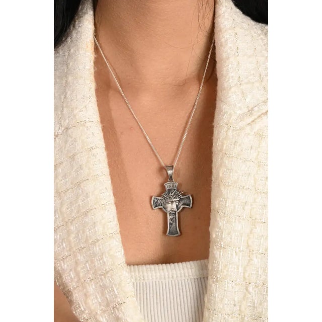 This religious unisex pendant features Jesus Christ on the crucifix cross, beautifully crafted in 925 sterling silver for...