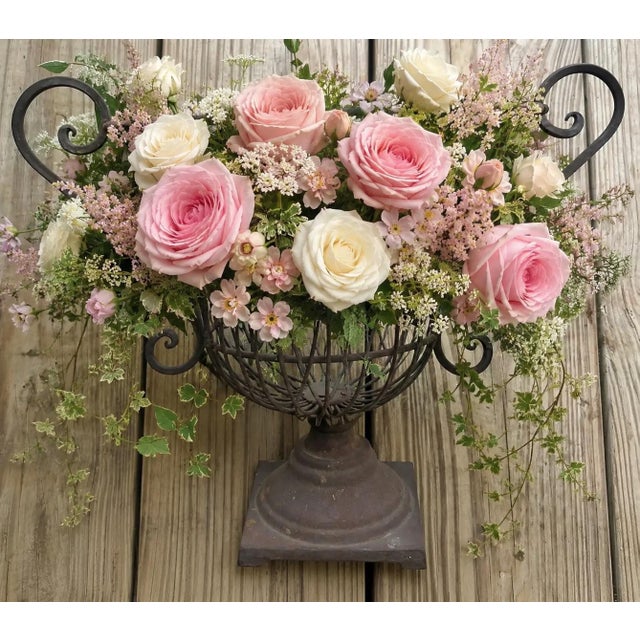 Lovely lines on this French Country style iron garden urn. It’s in very nice vintage condition and would make a stunning...