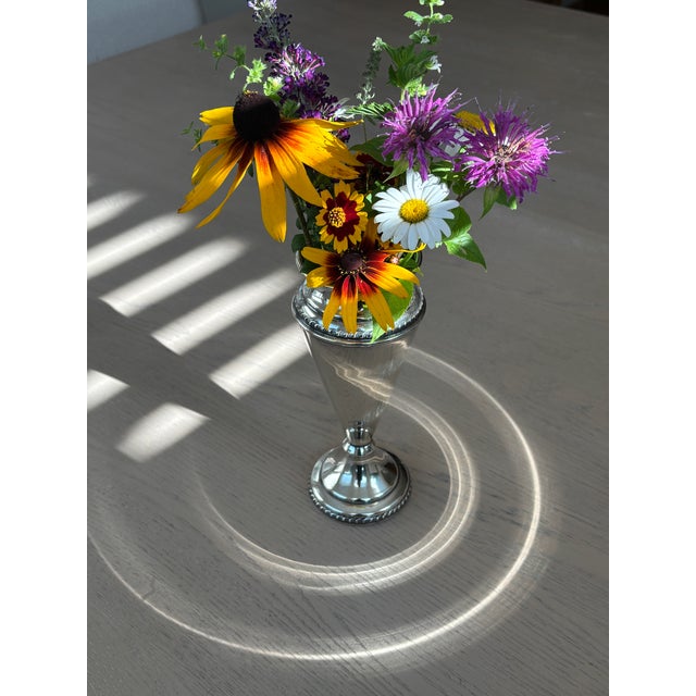 Bring classic traditional elegance to your mantle, entry console, or dining tablescape with this striking vintage silver-...