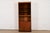 A beautiful Milo Baughman style lighted display cabinet, bar cabinet, or bookcase By Jack Cartwright for Founders USA,...