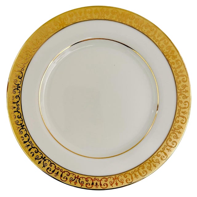 A classic set of twelve vintage bread and butter plates by the Federated Department Stores (the old Macy's name) and...
