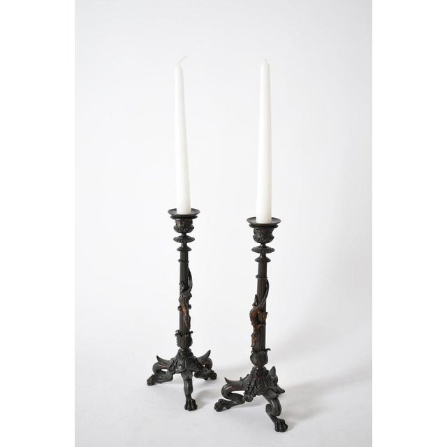 Set of four tripod zoomorphic bronze candleholders, XIXth c. Height: 30 cm - 11.81 in Length: 12 cm - 4.72 in Width: 12 cm...