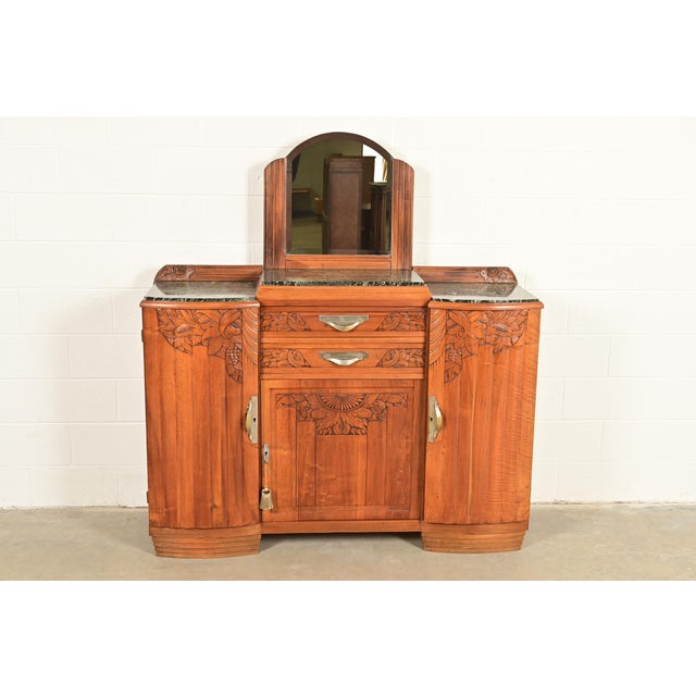 An exceptional antique Art Deco sideboard, credenza, buffet server, or bar cabinet In the manner of Louis Majorelle...