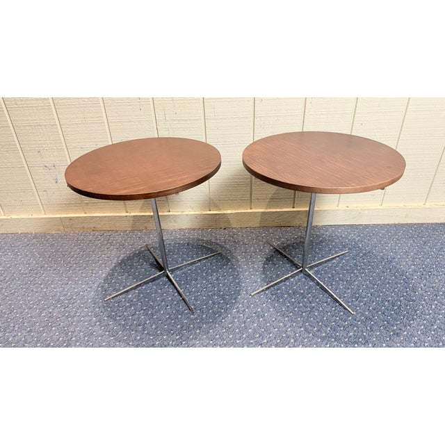 This sleek duo from Bernhardt brings understated mid-century modern style to any room. Each table features a round walnut-...