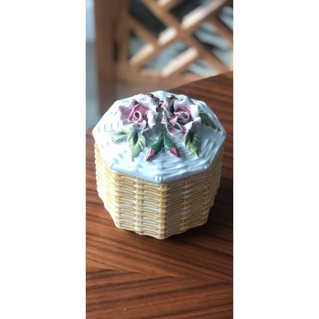 This beautiful rose topped box was hand-crafted in Italy by a skilled ceramic artisan and features two roses in full bloom...