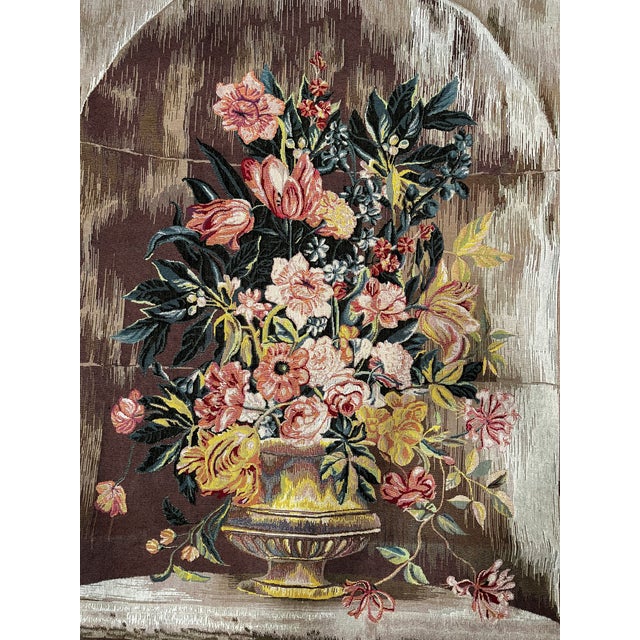 The ceramic vase tapestry has vibrant colors in its arrangement of colors over the base. It is fully lined, with a rod...