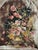 The ceramic vase tapestry has vibrant colors in its arrangement of colors over the base. It is fully lined, with a rod...