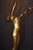 A striking french art deco figural table lamp dating to the 1930s, combining sculptural metalwork with marble, black glass...