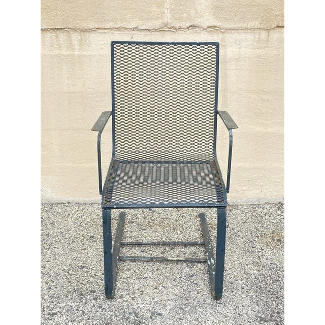 Vintage Industrial Modern Green Wrought Iron Metal Mesh Cantilever Garden Patio Chair. Circa Mid 20th Century....
