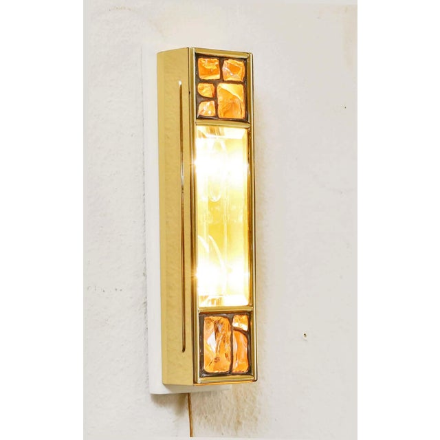 Art Nouveau Wall Lamp Art Nouveau wall lamp, circa 1910. Lamp in Secessionist style, elongated shape. The front glass...