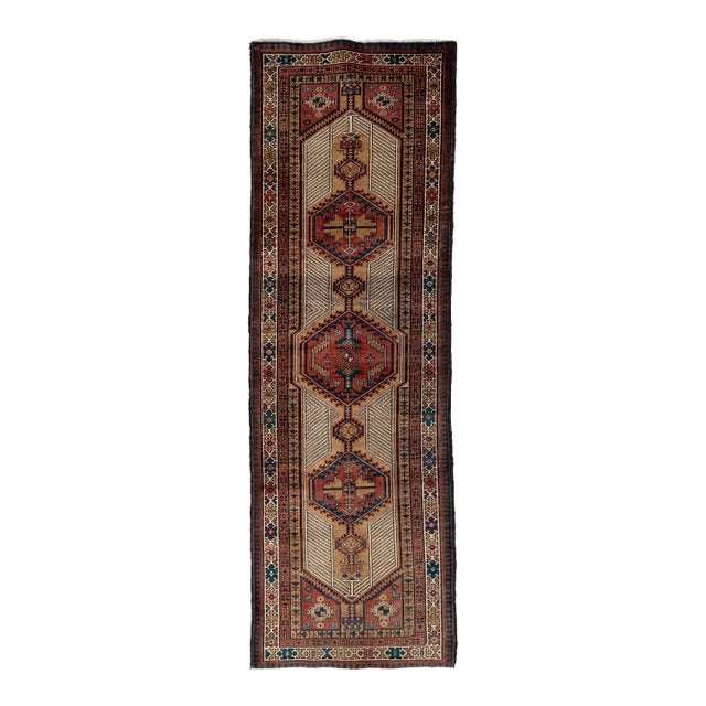 Vintage Hand-Knotted Kurdish Long Runner Rug With Diamond Medallions in Terracotta, Camel, and Indigo For Sale