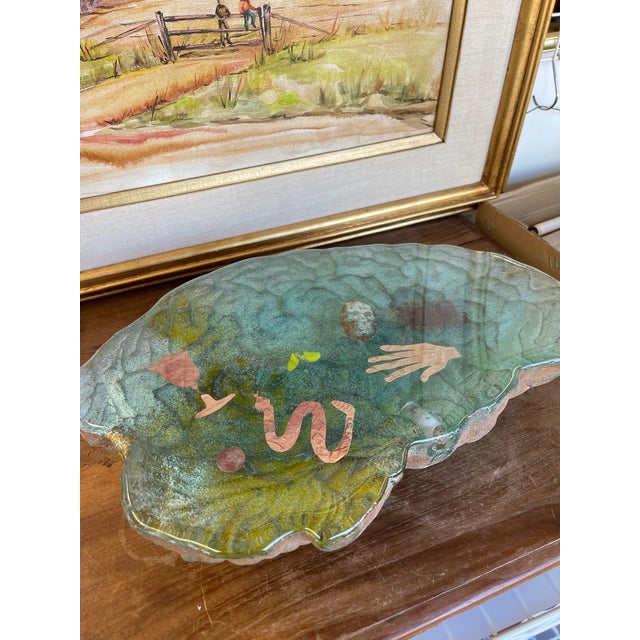 This vintage sculptural piecr is formed from thick cast material with an organic, freeform outline and substantial weight....