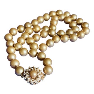 Vintage Peach Champagne Pearl Necklace With Sunburst Jeweled Clasp For Sale