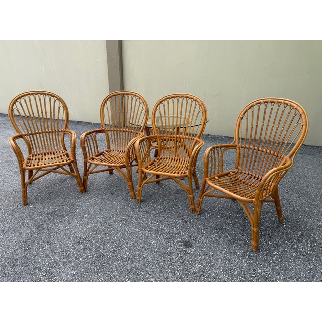 Marvelous vintage Coastal Island Rattan glass top dining or game table & 4 matching chairs, a set. Beautiful condition, No...