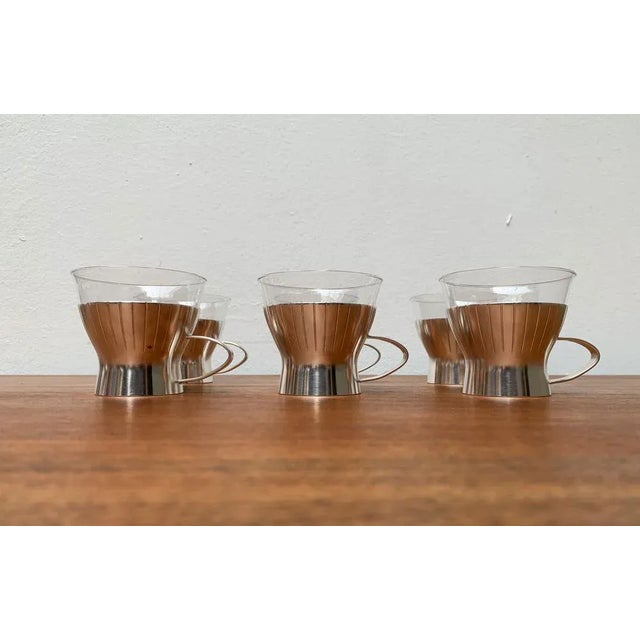 Mid-Century German Tea Glasses from WMF, 1960s, Set of 4, in Very Good conditions. Designed 1960 to 1969 This piece has an...