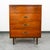 Clean 4 drawer highboy dresser by an American furniture maker during the 1960s era. Tons of storage throughout the piece....