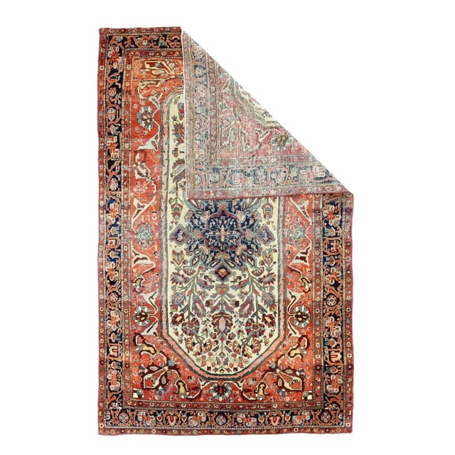 The rust field displays vigorous forked arabesques which provide a proper surround for the elongated octagonal sand...